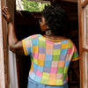 

Suncatcher - T-shirt con Scollo Quadrato e Intarsio
6