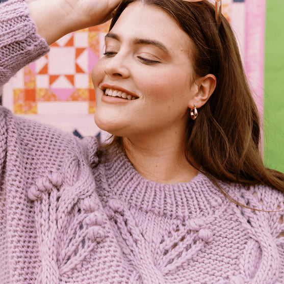 

Apotheosis - Maglione con trecce e punto nocciolina
7