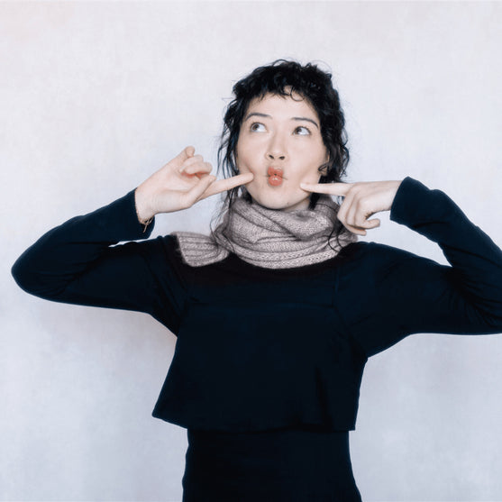 

Isley - Sciarpa traforata con trecce
3