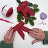 

Fiocco all’uncinetto - Decorazione natalizia
7