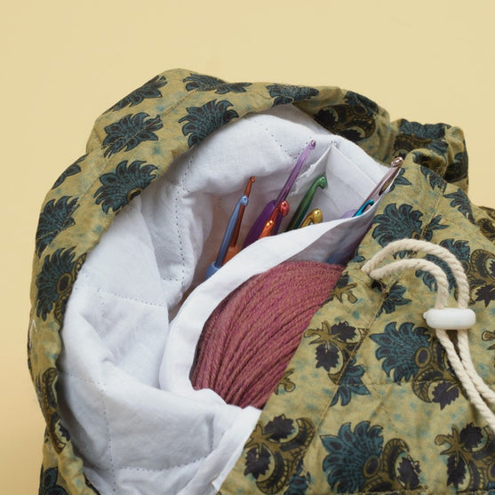 

Borsa cilindrica a tracolla trapuntata - Hobbii
2