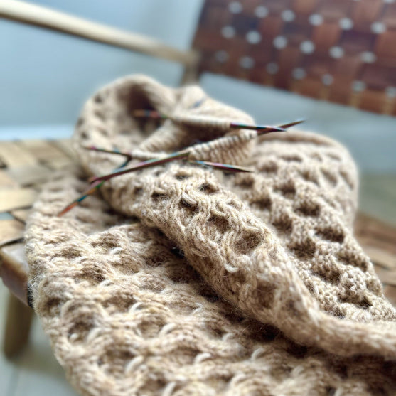 

Cella - Scialle con maniche
4