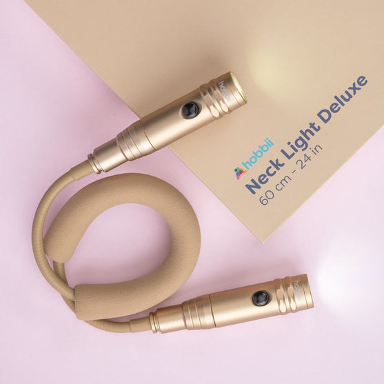 

Punto luce da collo Deluxe - Champagne - Hobbii
2